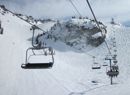 a ski lift with a few seats
