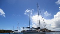 a group of sailboats in the water