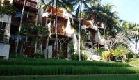 a building with trees and plants