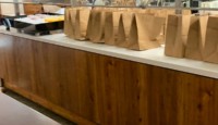 a counter with bags on it