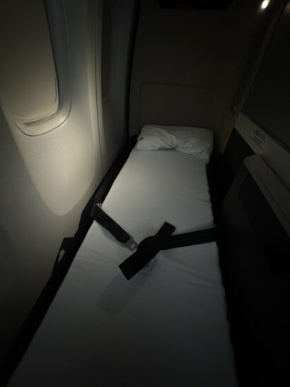 a bed with a seat belt on it