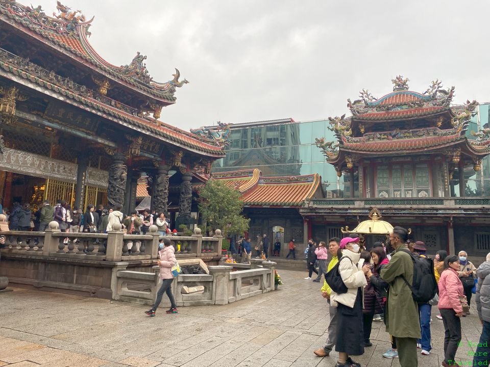 Big buildings, night markets, and cats in Taipei - Longshan Temple courtyard