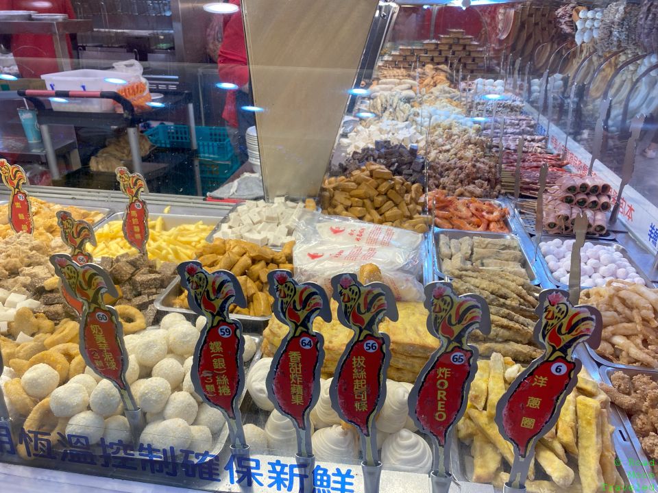 a display case with food items