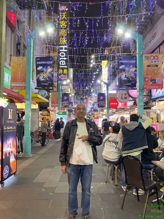 Big buildings, night markets, and cats in Taipei - Ximending pedestrian area