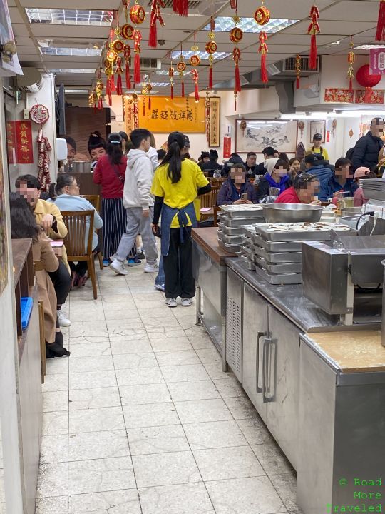 a group of people in a restaurant