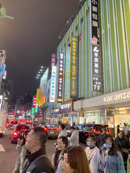 Walking through Ximending pedestrian area, Taipei