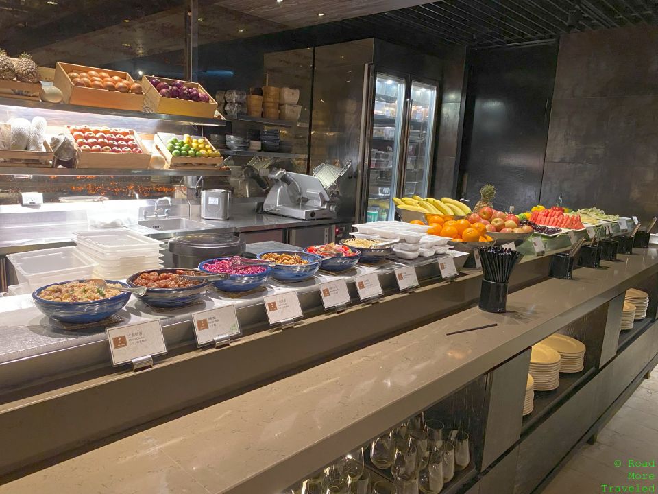 a counter with different types of food on it