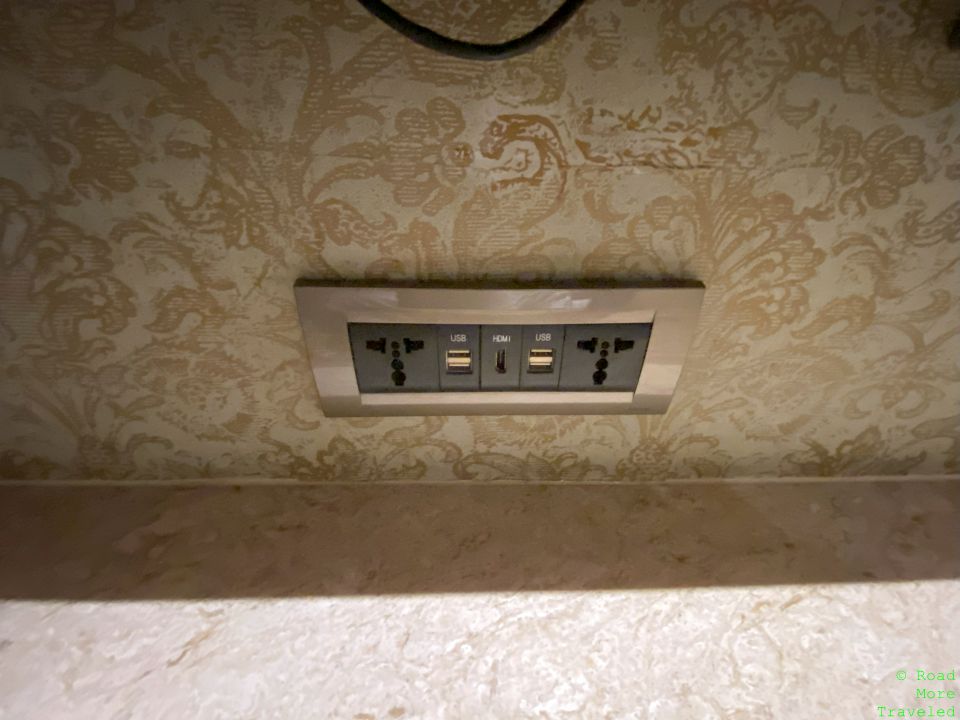 a wall outlet with a power cord