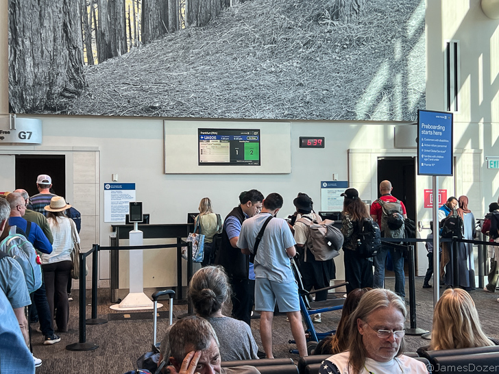 a group of people in an airport