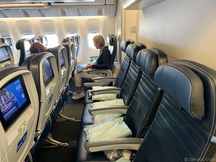 a woman sitting on a plane