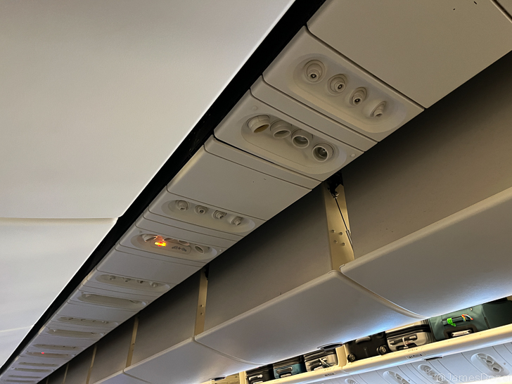 an overhead lights on a plane