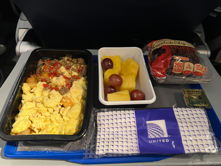 food in containers next to a bag of food