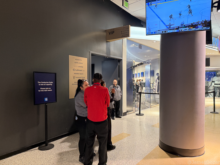 people standing in a hallway