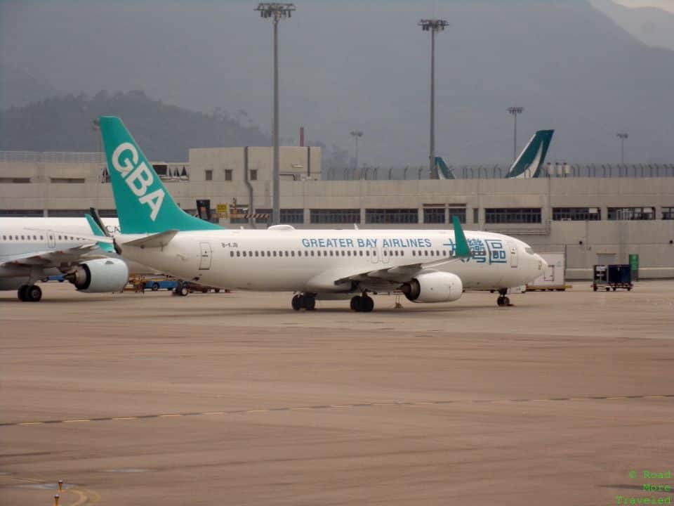 a white airplane on the tarmac