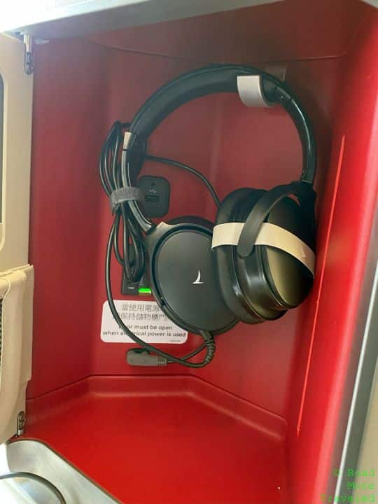 a pair of headphones in a red box