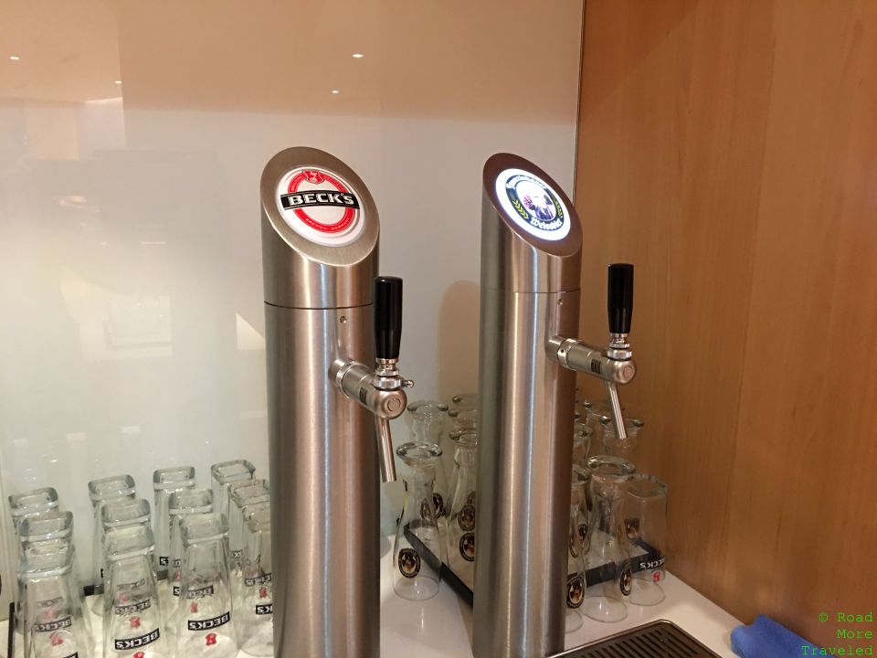 a group of beer taps on a counter