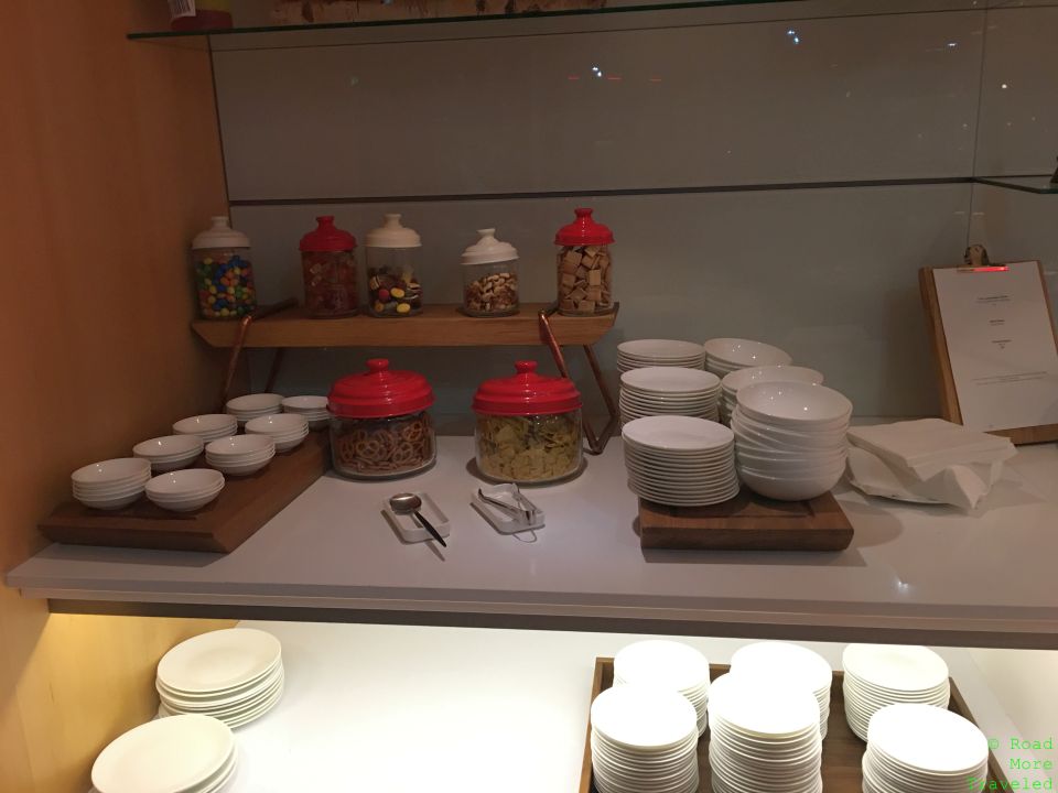 a counter with a variety of bowls and containers