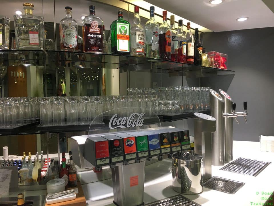 a bar with many bottles of alcohol