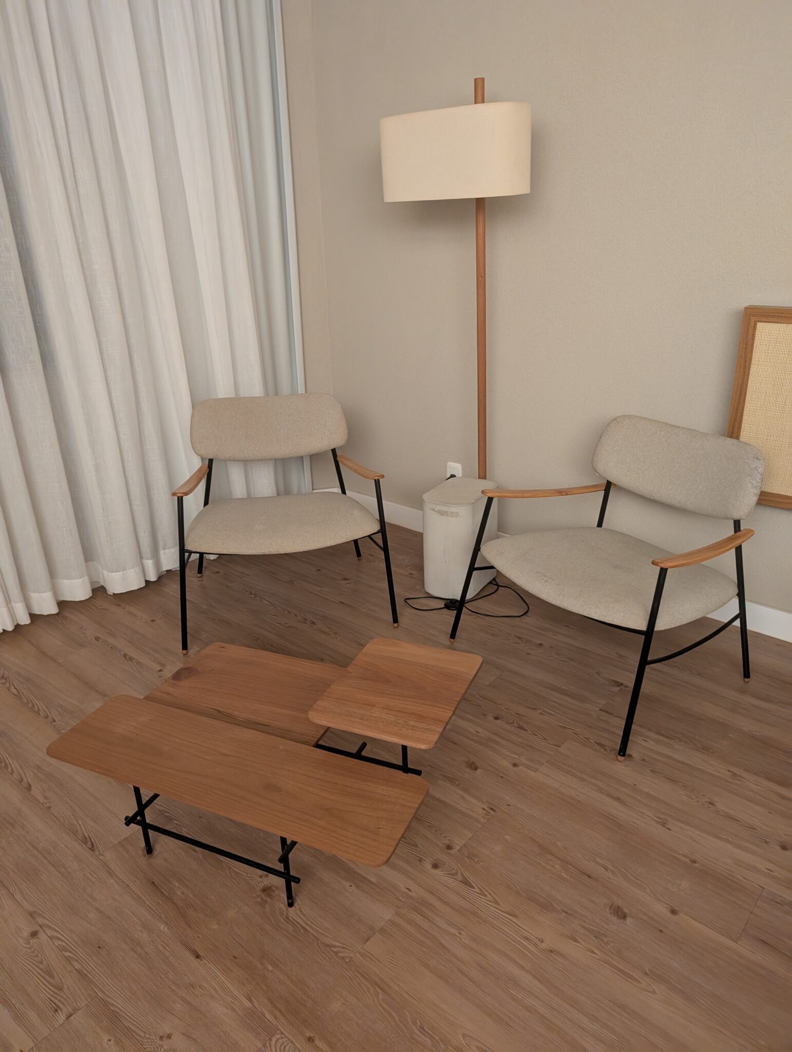 a group of chairs and a table in a room