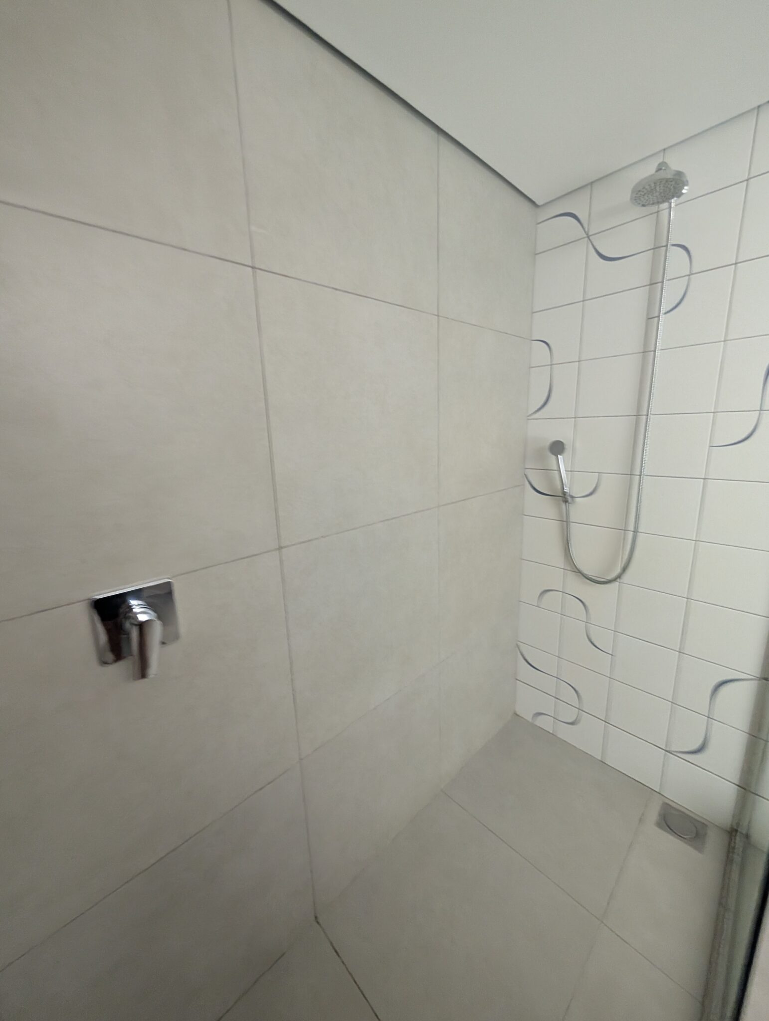 a shower with a shower head