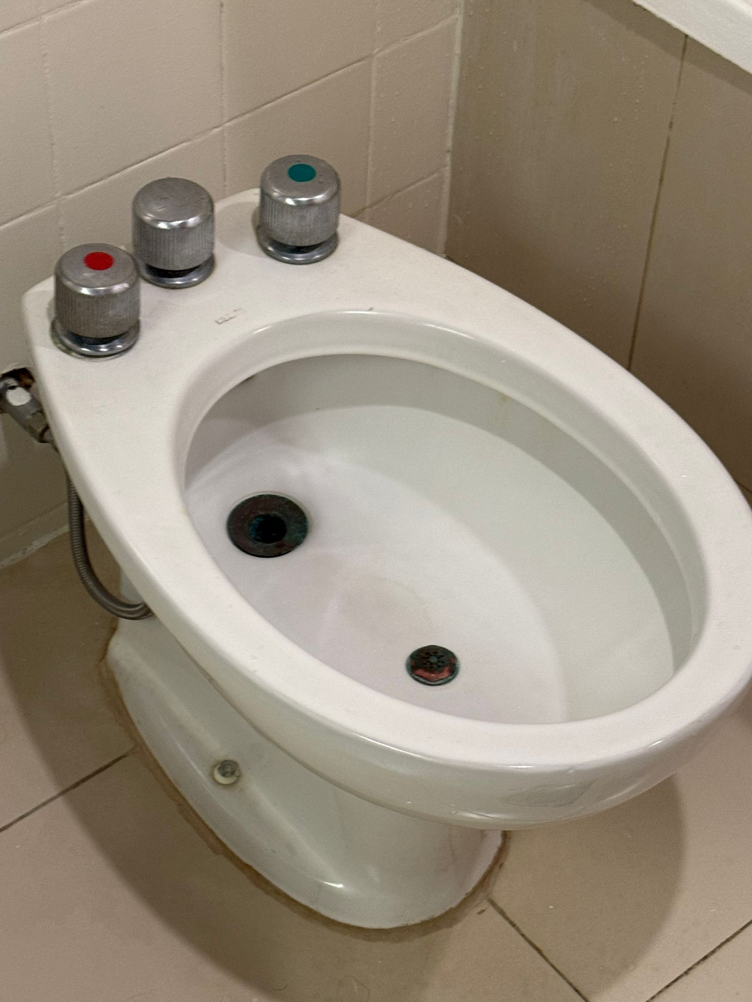 a toilet with a white toilet bowl