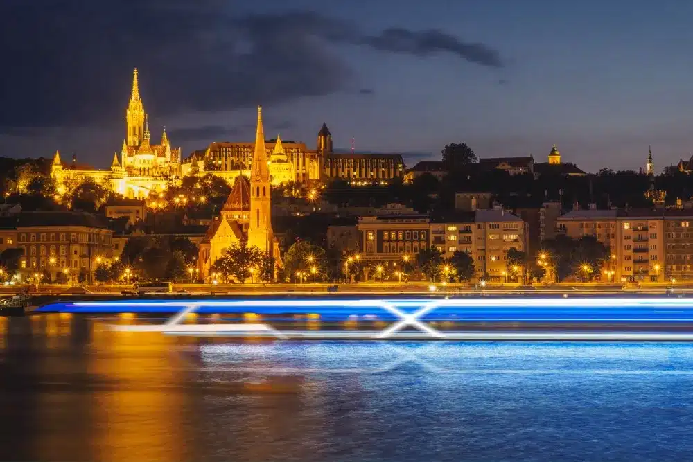 a city with lights on the water